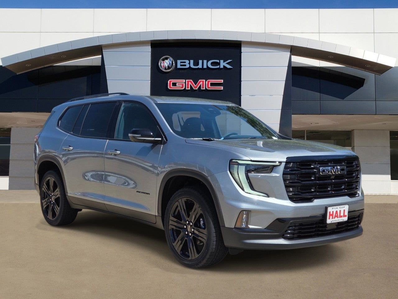 2026 GMC Acadia Elevation in Sterling Metallic — front three-quarter view