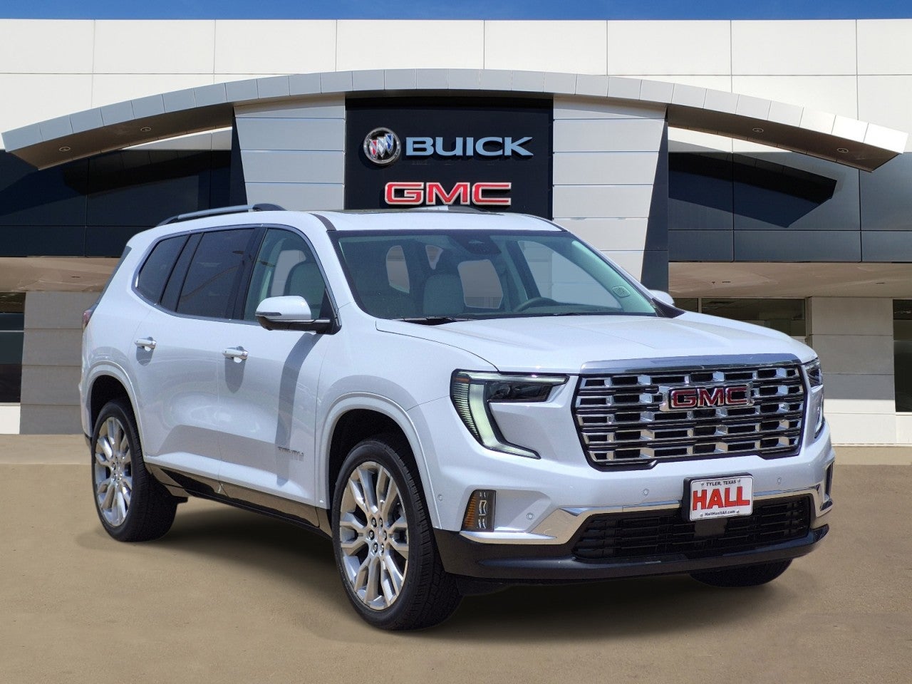 2026 GMC Acadia Denali in Glacier White Tricoat — front three-quarter view