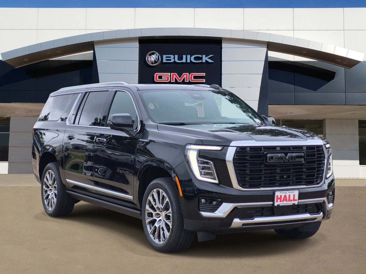 2026 GMC Yukon XL Denali in Onyx Black — front three-quarter view