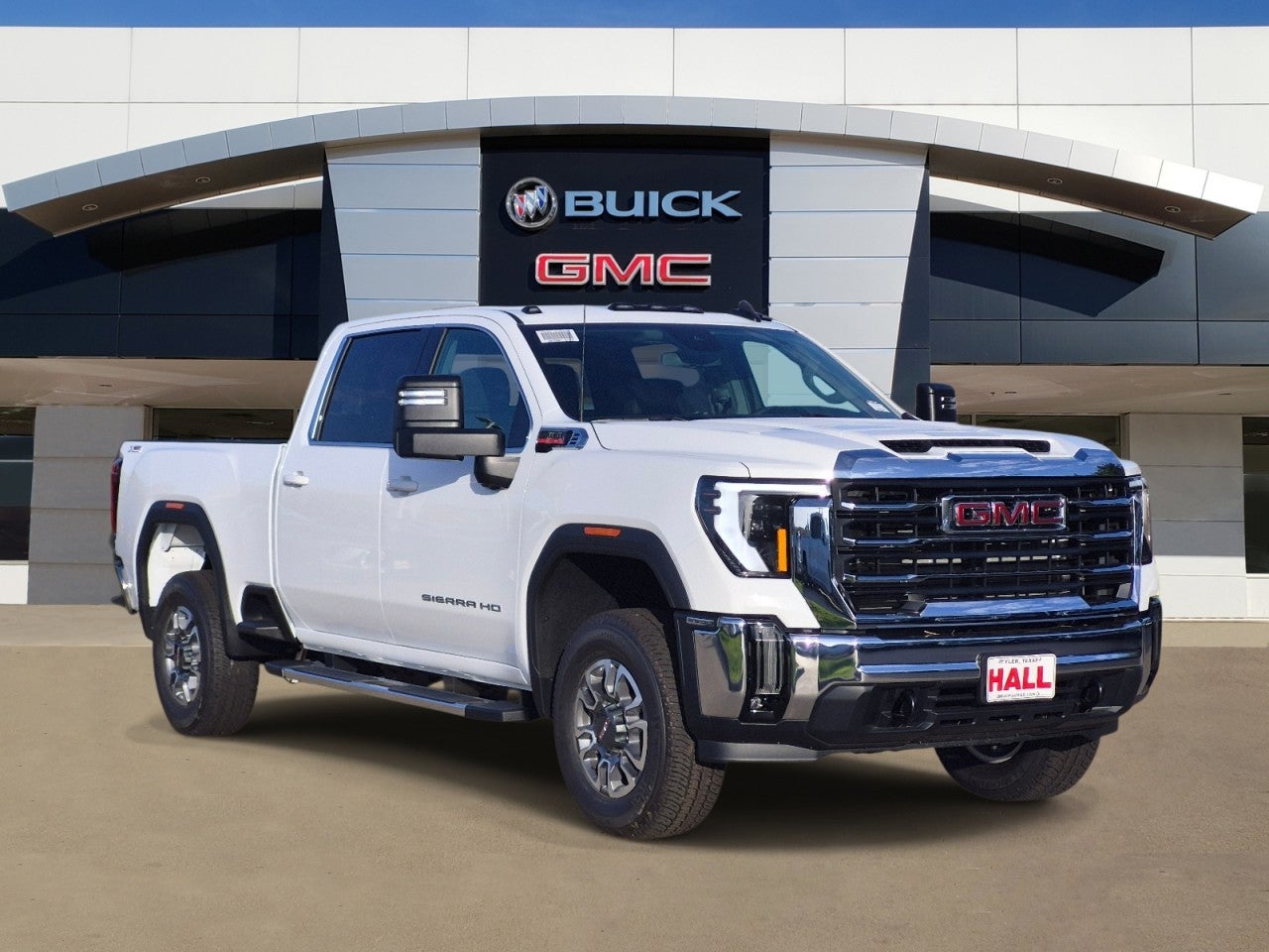 2026 GMC Sierra 2500 HD SLE in Summit White — front three-quarter view