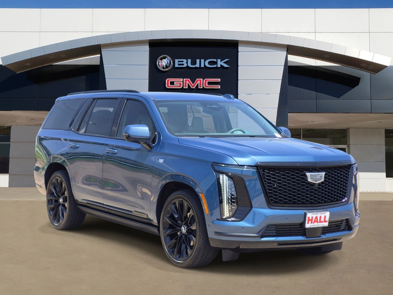 2025 Cadillac Escalade Sport Platinum in Deep Sea Metallic — front three-quarter view