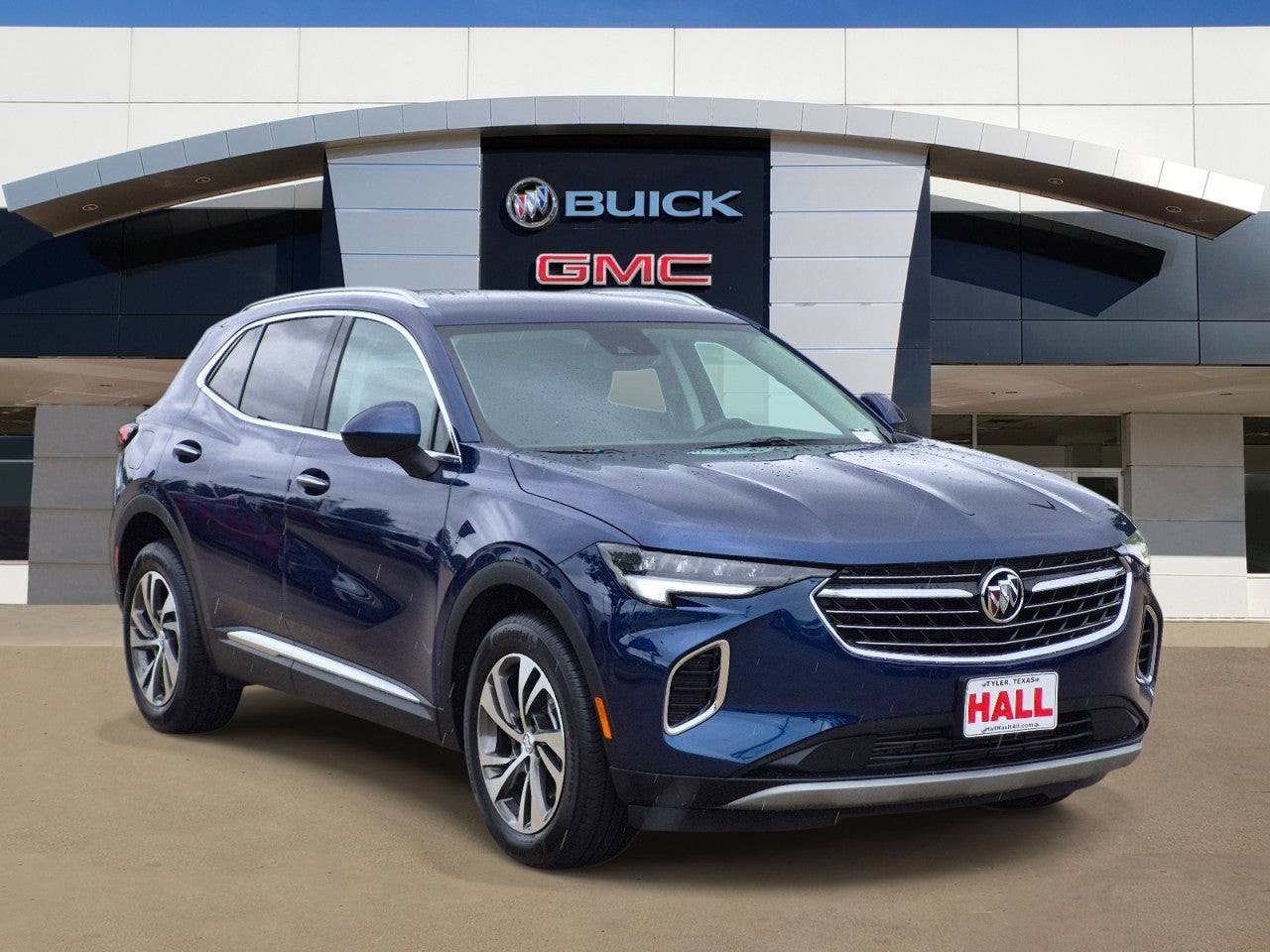 2023 Buick Envision Essence in Sapphire Metallic — front three-quarter view