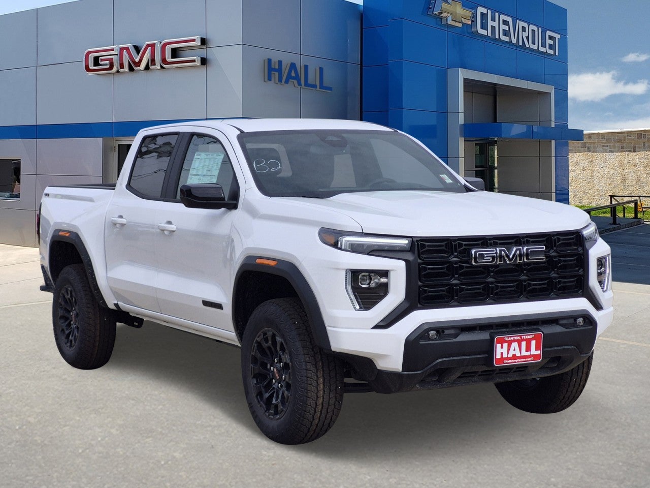 2026 GMC Canyon Elevation in Summit White — front three-quarter view