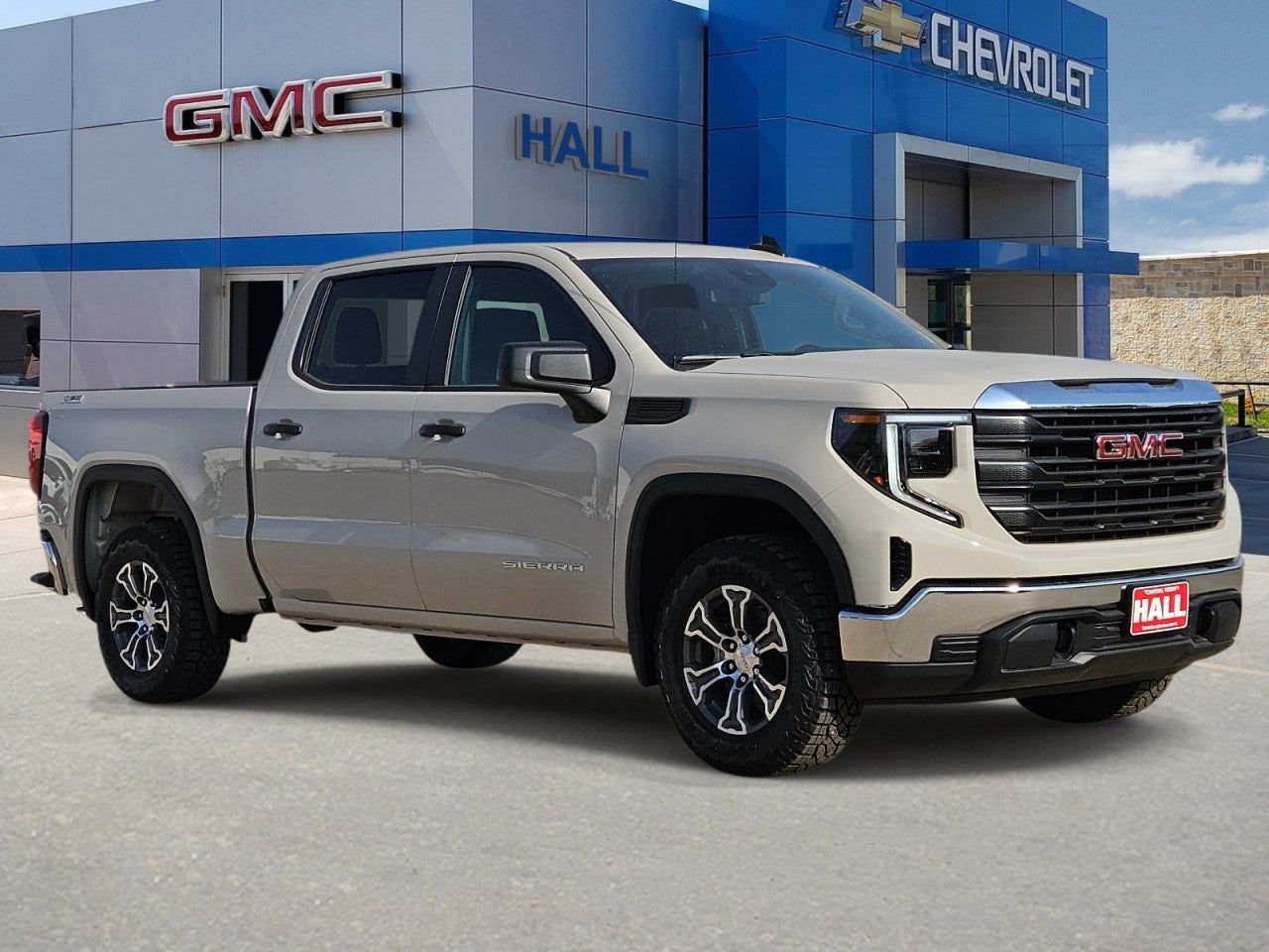 2026 GMC Sierra 1500 Pro in Coastal Dune — front three-quarter view